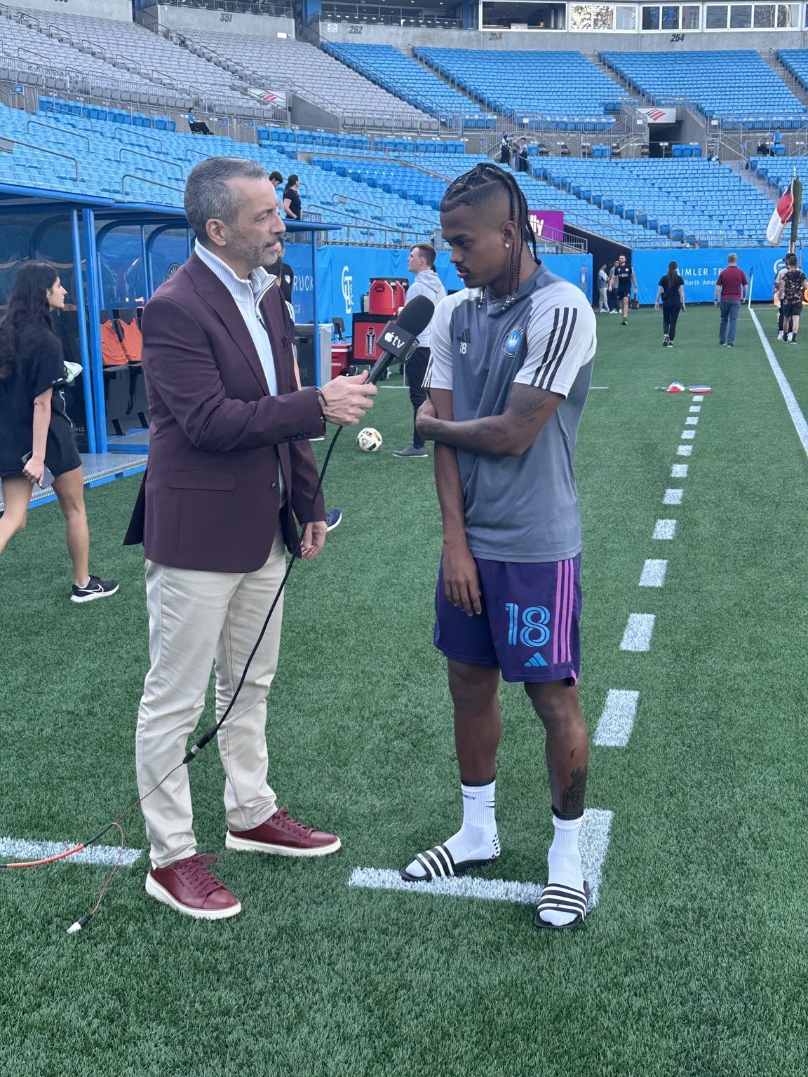 Daniel Chapela interviewing a Charlotte FC player at the stadium
